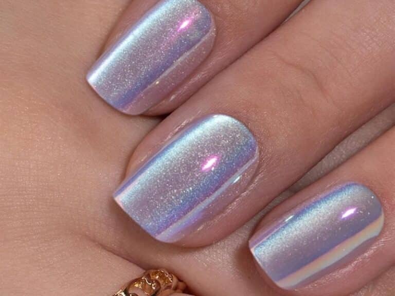 Curvlife purple chrome cat eye
press-on nails with mirror
finish and soft gel construction